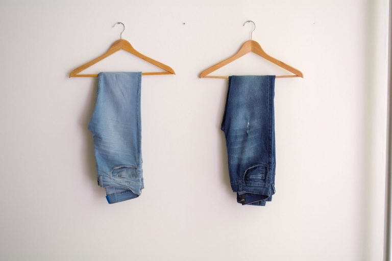 two hanged blue stonewash and blue jeans