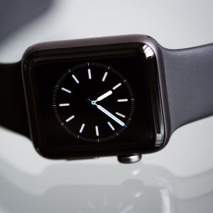 black apple watch with black sports band